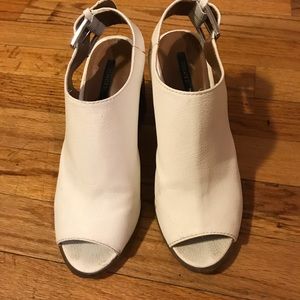 White faux leather sandals